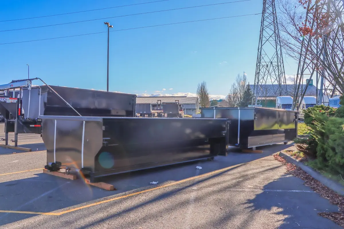 Roll-off dumpster ready for waste disposal at job site for Roofing Dumpster Rental in Griswold